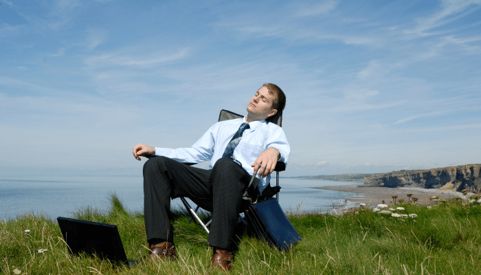 guy resting on chair with eyes closed