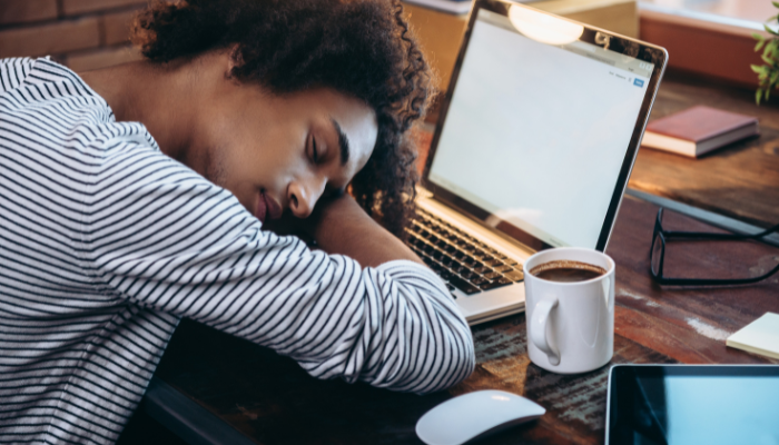 man taking a nap in front of computer
tired but can't sleep