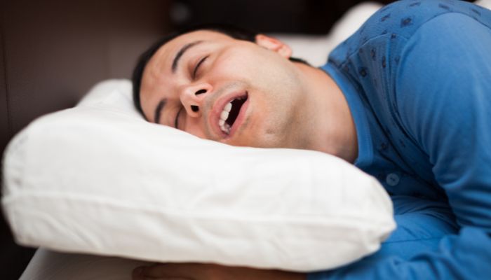 man sleeping on pillow mouth open
what else does circadian rhythm affect besides sleep