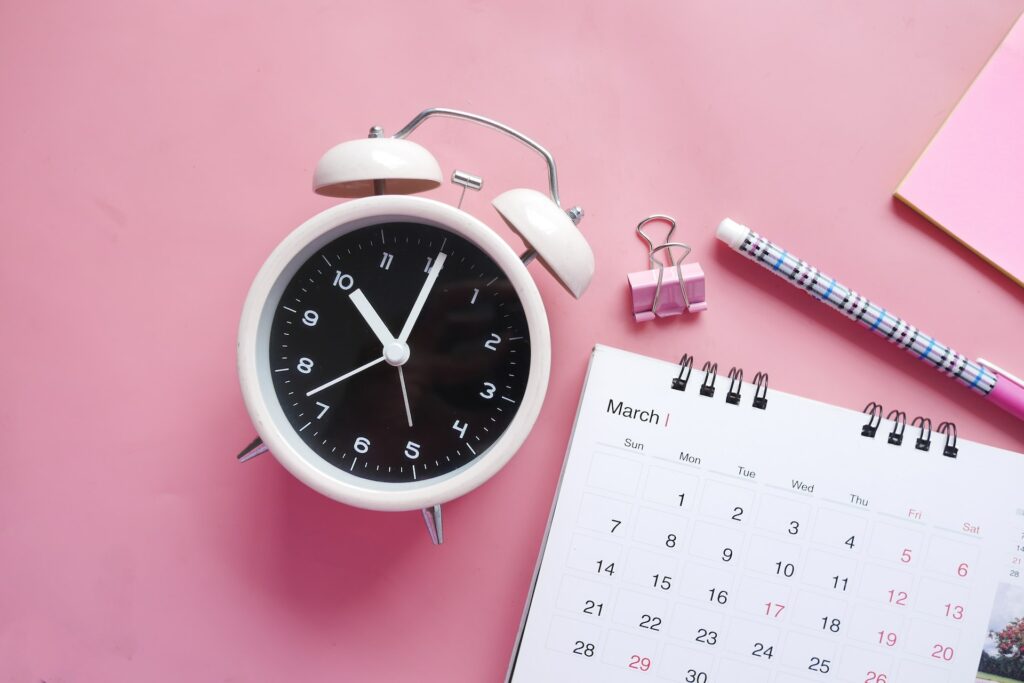 white and pink analog alarm clock
uberman sleep