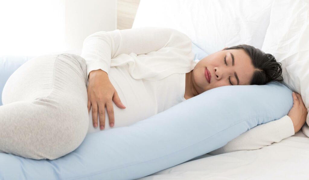 pregnant women sleeping on side 
stomach sleeper