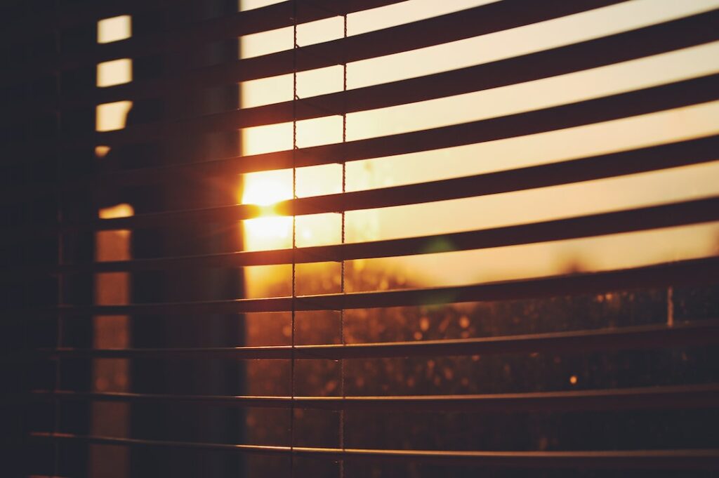 opening blinds for natural light
