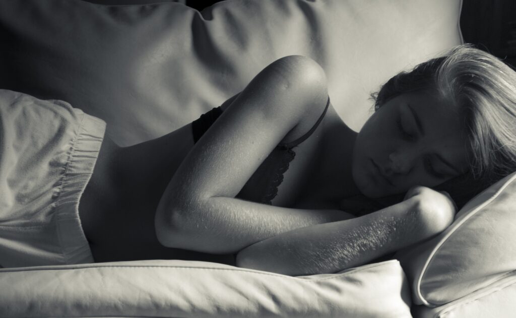 women sleeping wearing black top