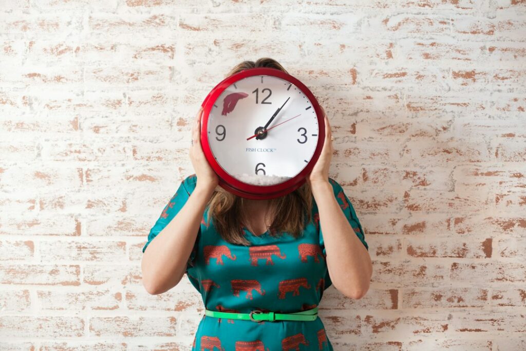 woman holding clock over face
gradually circadian rhythm sleep schedule