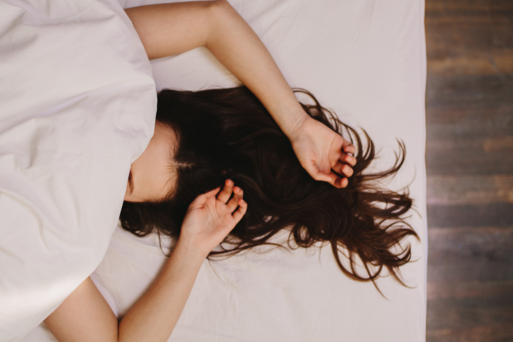 woman sleeping with head facing east direction 