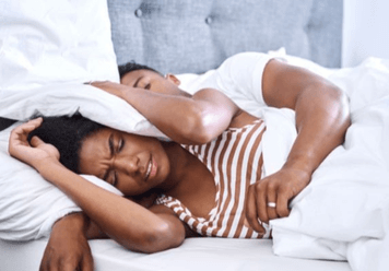 How To Sleep With Someone Who Snores? 6 Tips